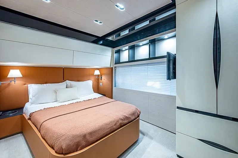 Lucky 7 Yacht Photos Pics Luxurious bedroom interior of 2017 Azimut 80 yacht with modern design and cozy ambiance.