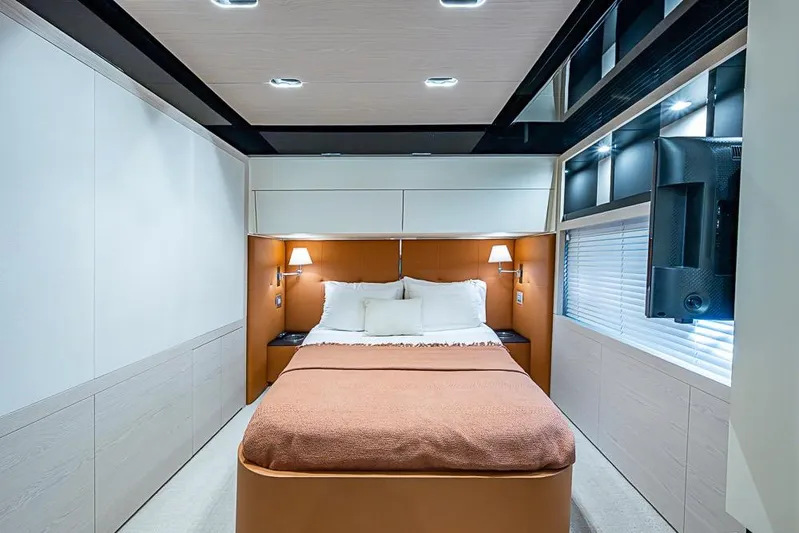 Lucky 7 Yacht Photos Pics Luxurious bedroom interior of 2017 Azimut 80 yacht with modern design and cozy ambiance.