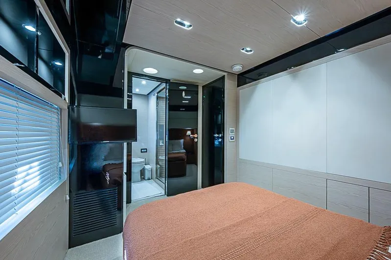 Lucky 7 Yacht Photos Pics Luxurious interior of 2017 Azimut 80 yacht bedroom with modern design and ensuite bathroom.