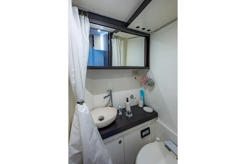 Lucky 7 Yacht Photos Pics Luxurious bathroom in 2017 Azimut 80 yacht with modern fixtures and elegant design.