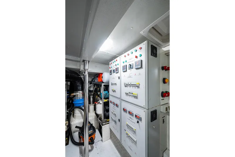 Lucky 7 Yacht Photos Pics Electrical control room of 2017 Azimut 80 yacht, featuring panels and equipment.
