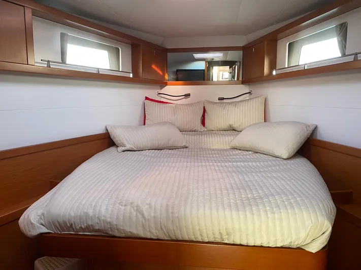  Yacht Photos Pics Luxurious cabin interior of 2014 Beneteau Sense 50 yacht with cozy bedding.