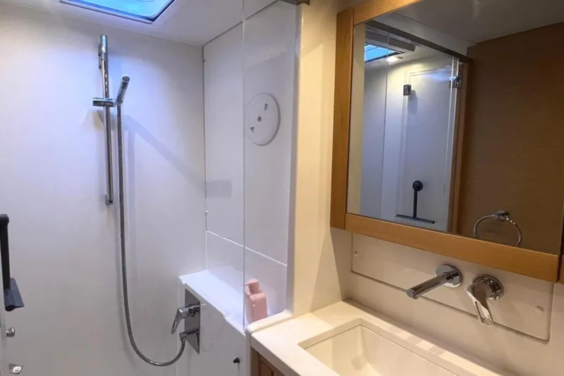  Yacht Photos Pics Modern bathroom interior of 2018 Lagoon 450S yacht with shower and sink.