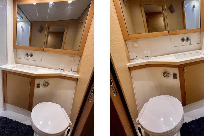  Yacht Photos Pics Modern bathroom interior of 2018 Lagoon 450S yacht, featuring sleek sink and mirror.