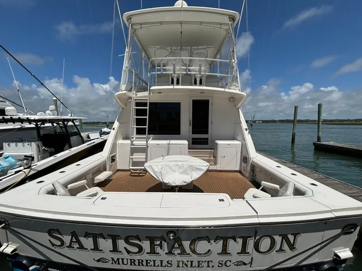 Satisfaction Yacht Photos Pics Bertram 60 Convertible 1999 yacht Satisfaction docked at Murrells Inlet, SC.