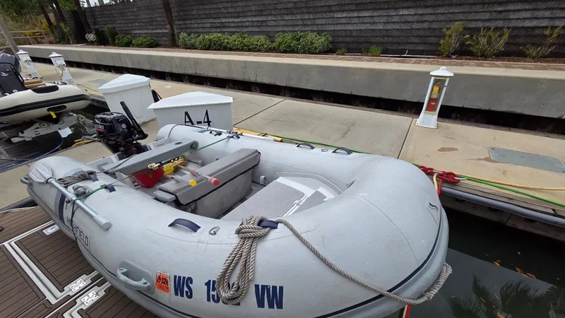 Always Friday Yacht Photos Pics Inflatable boat docked beside 2000 Cruisers Yachts 4450 Express Motoryacht.