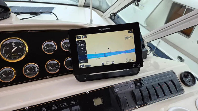 Always Friday Yacht Photos Pics Dashboard of 2000 Cruisers Yachts 4450 Express Motoryacht with navigation system.