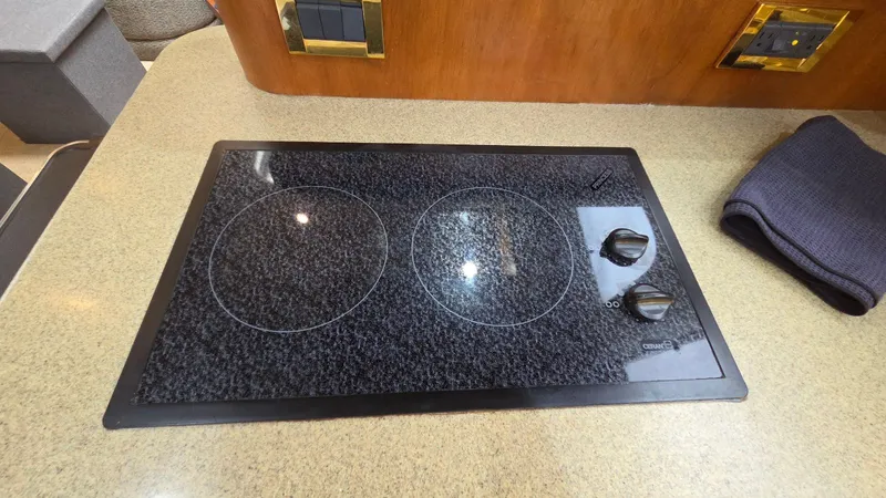 Always Friday Yacht Photos Pics Kitchen area of the 2000 Cruisers Yachts 4450 Express Motoryacht.