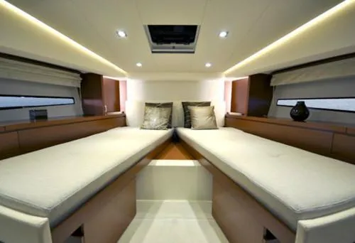 Ultima Risa Yacht Photos Pics Interior of 2016 Prestige 450 S yacht with twin beds and modern lighting.