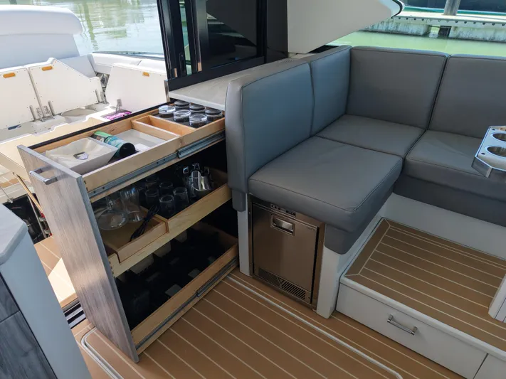 The Legacy Yacht Photos Pics 2022 Formula 500 SSC yacht interior with seating and storage drawers.