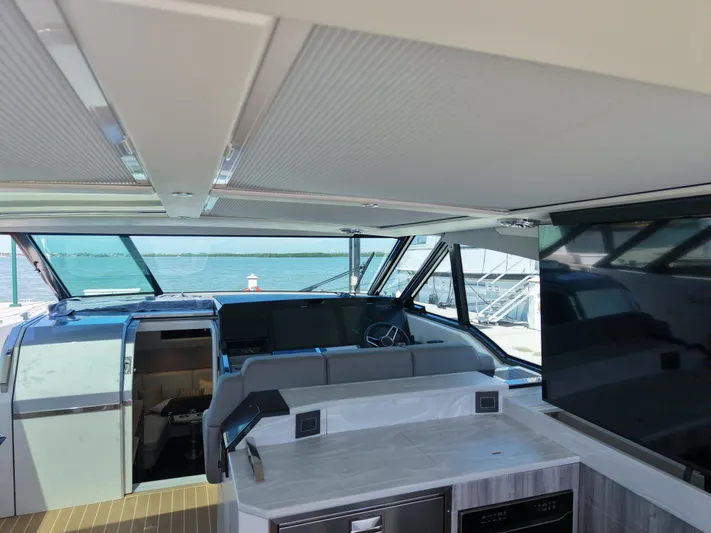 The Legacy Yacht Photos Pics Interior view of 2022 Formula 500 SSC yacht with modern design and ocean backdrop.