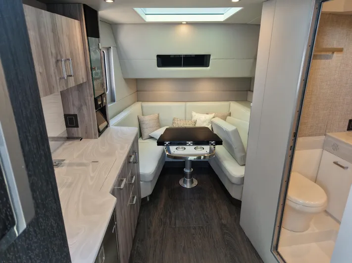 The Legacy Yacht Photos Pics 2022 Formula 500 SSC interior with modern kitchen, cozy seating, and elegant design.