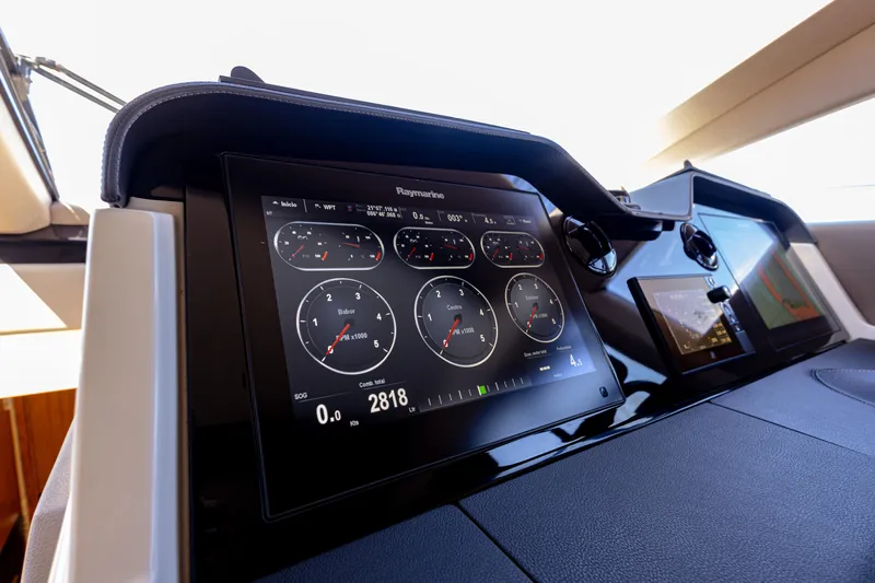 2018 Sea Ray L590 @ Cancun Yacht Photos Pics 2018 Sea Ray L590 dashboard with digital gauges and navigation displays.