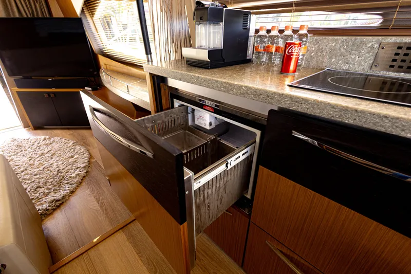 2018 Sea Ray L590 @ Cancun Yacht Photos Pics Luxurious 2018 Sea Ray L590 yacht kitchen with modern appliances and sleek cabinetry.