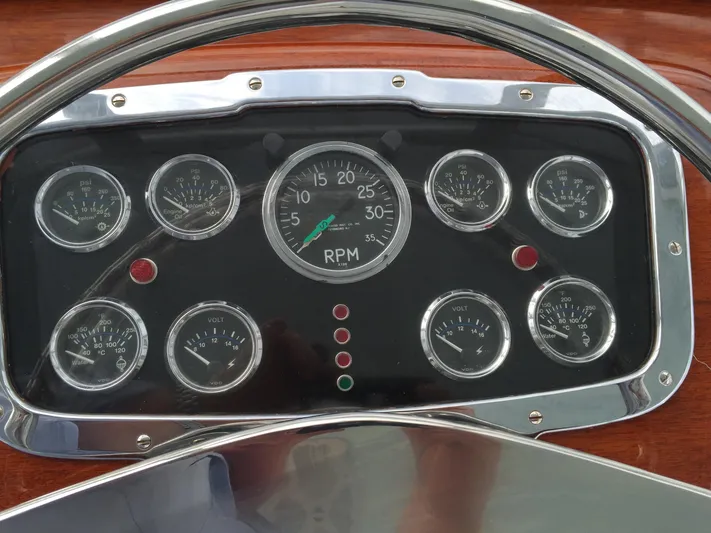Uncle Jack Yacht Photos Pics Dashboard of a 1965 Rybovich 37 Sportfish boat with multiple gauges and RPM indicator.