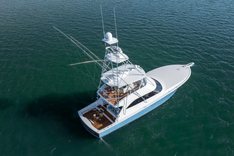 Reel Developers Yacht Photos Pics 2009 Viking 60 Convertible yacht on open water, aerial view.