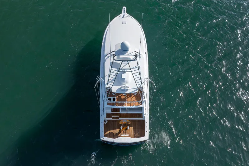 Reel Developers Yacht Photos Pics Aerial view of 2009 Viking 60 Convertible yacht cruising on open water.