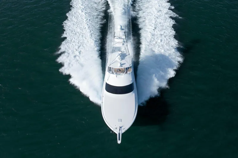 Reel Developers Yacht Photos Pics Aerial view of 2009 Viking 60 Convertible yacht cruising on open water.