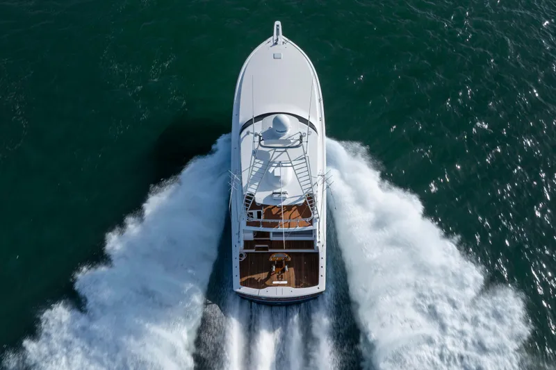 Reel Developers Yacht Photos Pics Aerial view of 2009 Viking 60 Convertible yacht cruising on open water.