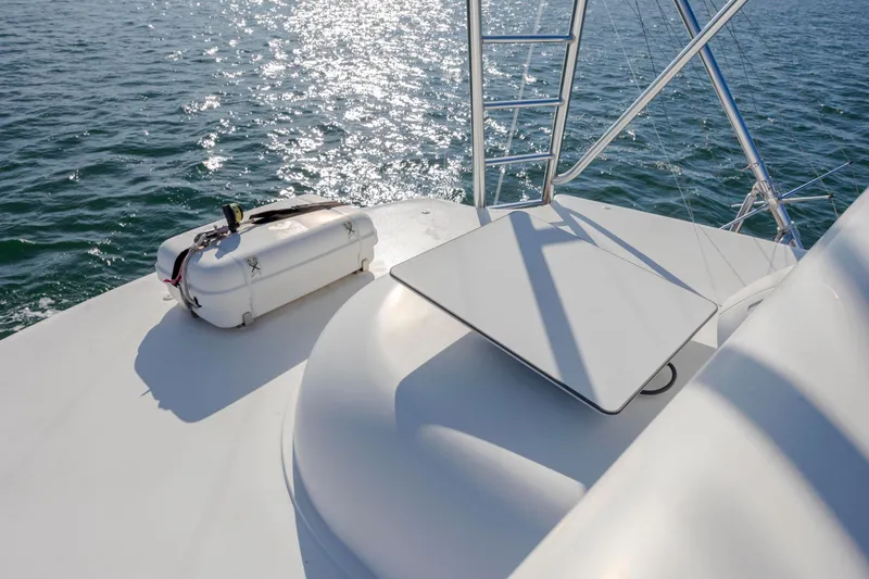 Reel Developers Yacht Photos Pics 2009 Viking 60 Convertible yacht deck with life raft and ocean view.