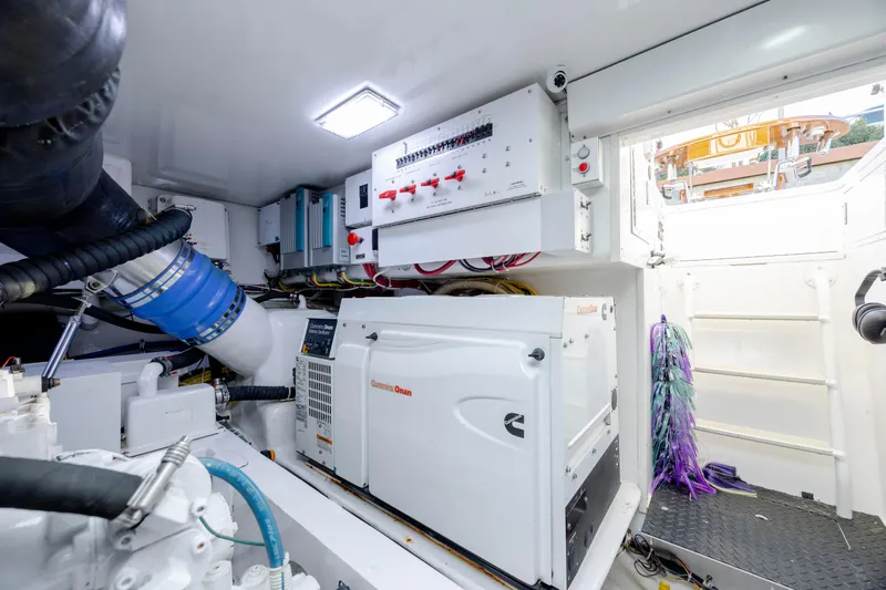 Reel Developers Yacht Photos Pics Engine room of 2009 Viking 60 Convertible yacht with Cummins Onan generator.