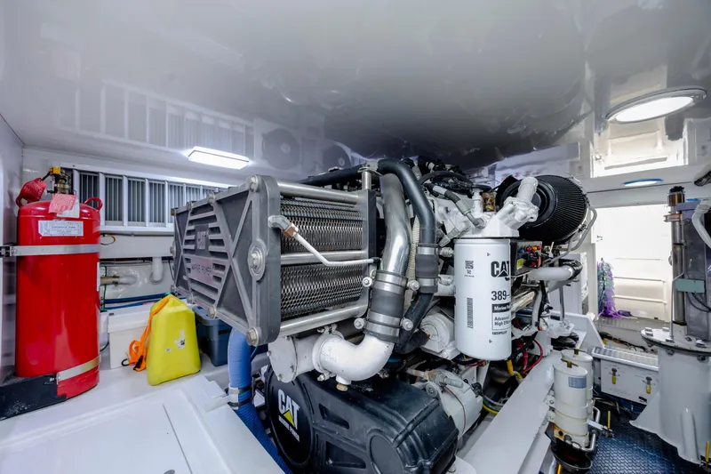 Reel Developers Yacht Photos Pics Engine room of 2009 Viking 60 Convertible yacht with CAT machinery and safety equipment.