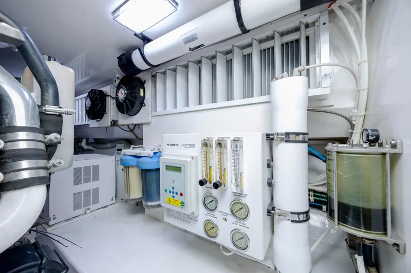 Reel Developers Yacht Photos Pics Engine room of 2009 Viking 60 Convertible yacht with advanced filtration system.