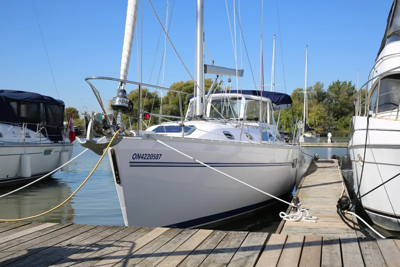Platypus Yacht Photos Pics 2014 Catalina 445 sailboat docked at marina on a sunny day.