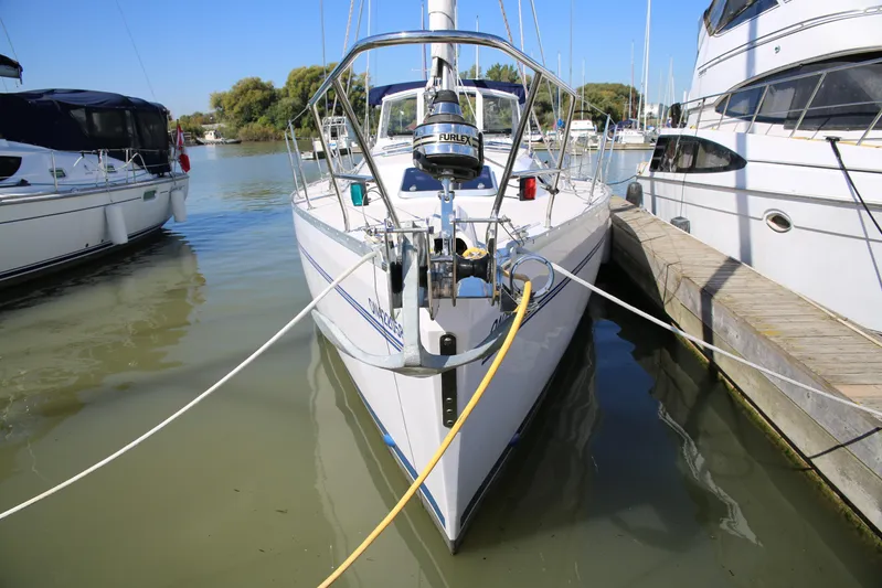 Platypus Yacht Photos Pics 2014 Catalina 445 sailboat docked in a marina, surrounded by other boats.