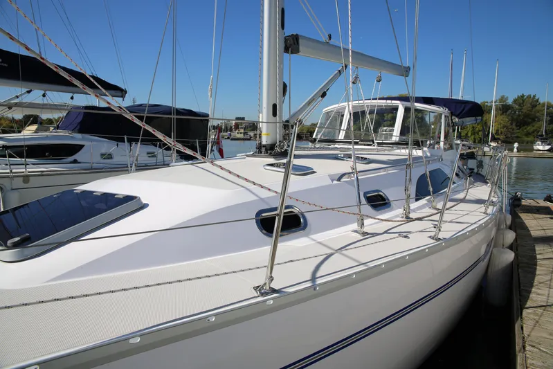 Platypus Yacht Photos Pics 2014 Catalina 445 sailboat docked at marina under clear blue sky.