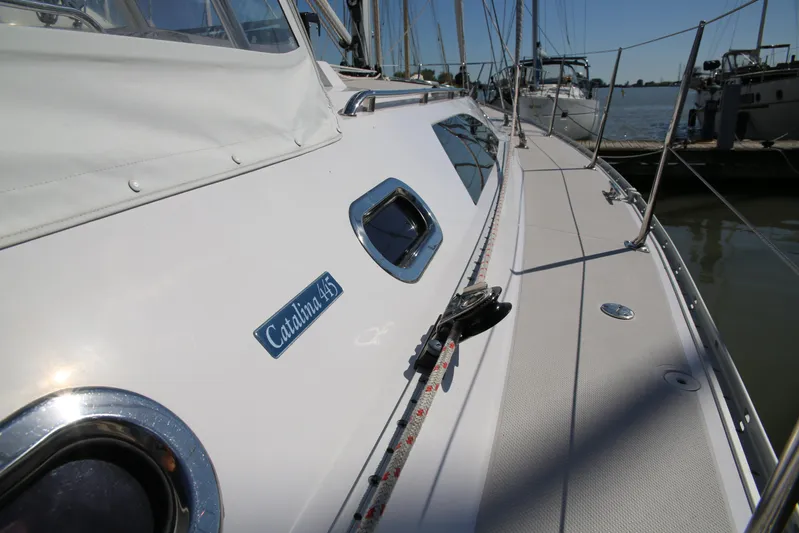 Platypus Yacht Photos Pics 2014 Catalina 445 sailboat docked, showcasing sleek deck design and branding.