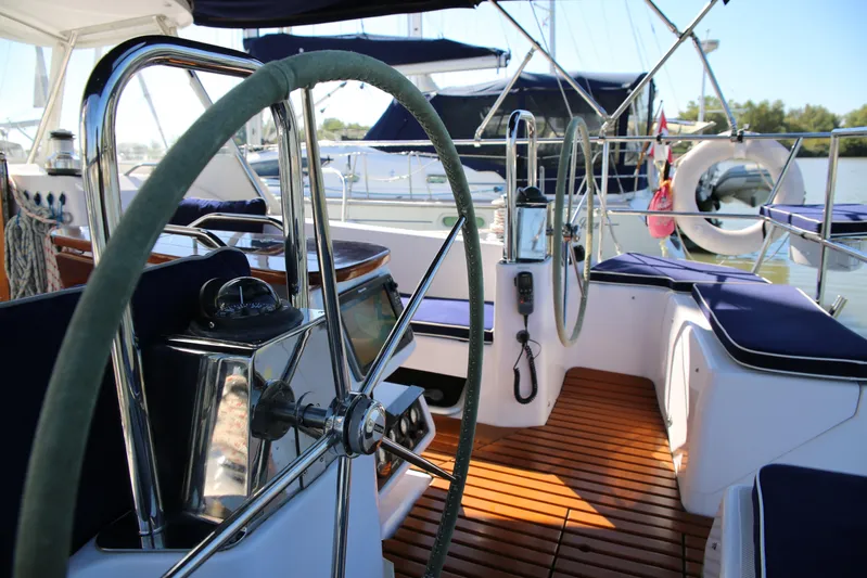 Platypus Yacht Photos Pics Interior view of a 2014 Catalina 445 sailboat cockpit with dual steering wheels.