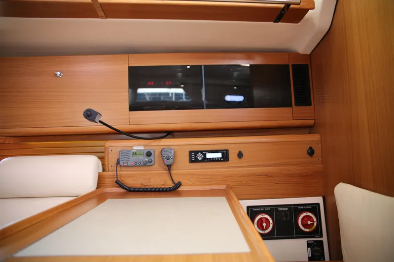 Platypus Yacht Photos Pics Interior of a 2014 Catalina 445 sailboat with navigation equipment and control panel.