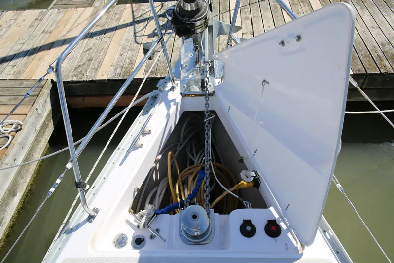 Platypus Yacht Photos Pics Open anchor locker on 2014 Catalina 445 sailboat, showing chain and ropes at dock.