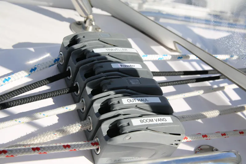 Platypus Yacht Photos Pics Close-up of Catalina 445 sailboat rigging system, featuring labeled ropes and cleats.