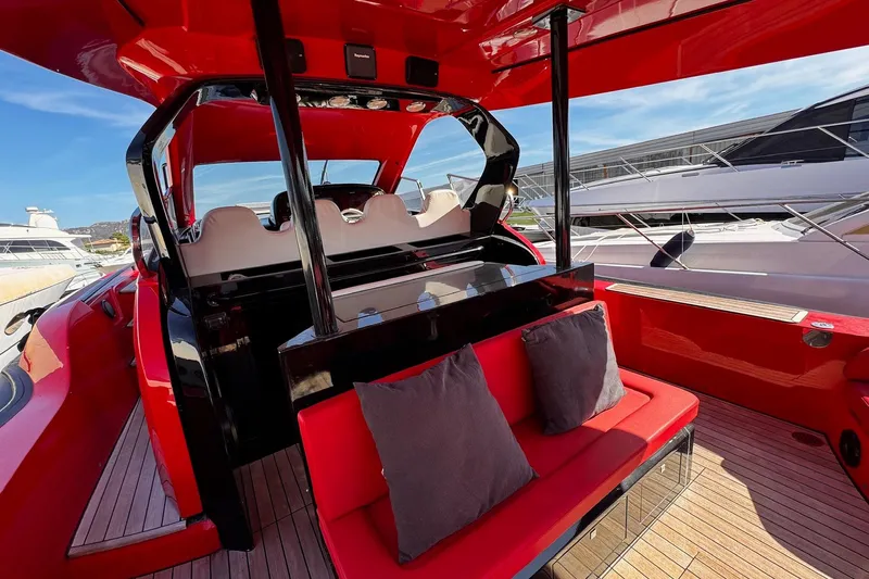  Yacht Photos Pics 2015 SACS Strider 19 luxury yacht interior with red seating and modern design.
