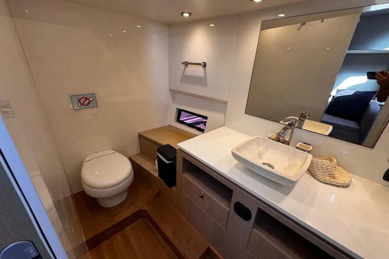  Yacht Photos Pics Luxurious bathroom interior of 2015 SACS Strider 19 yacht with modern fixtures.