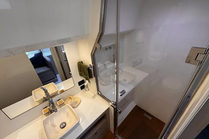  Yacht Photos Pics Luxurious bathroom interior of 2015 SACS Strider 19 yacht with modern fixtures.