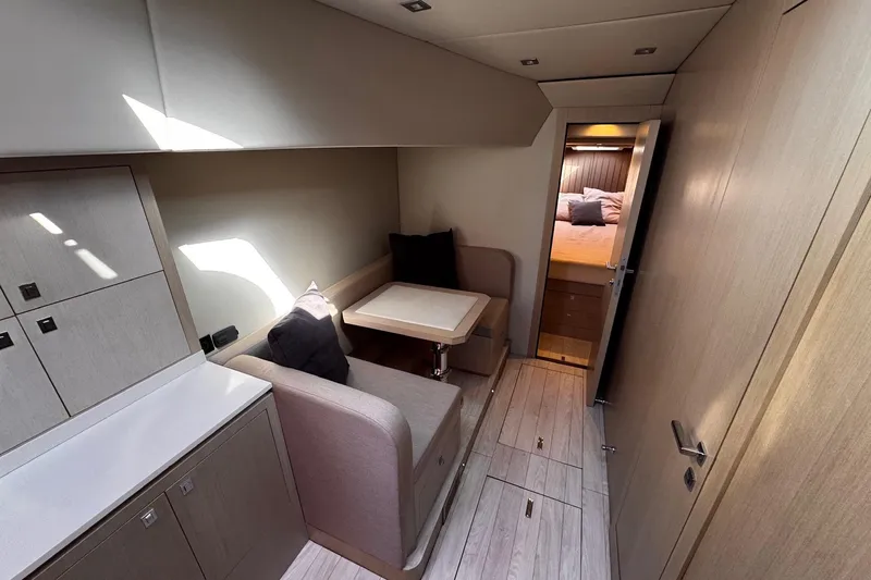  Yacht Photos Pics Luxurious interior of 2015 SACS Strider 19 yacht with cozy seating and modern design.