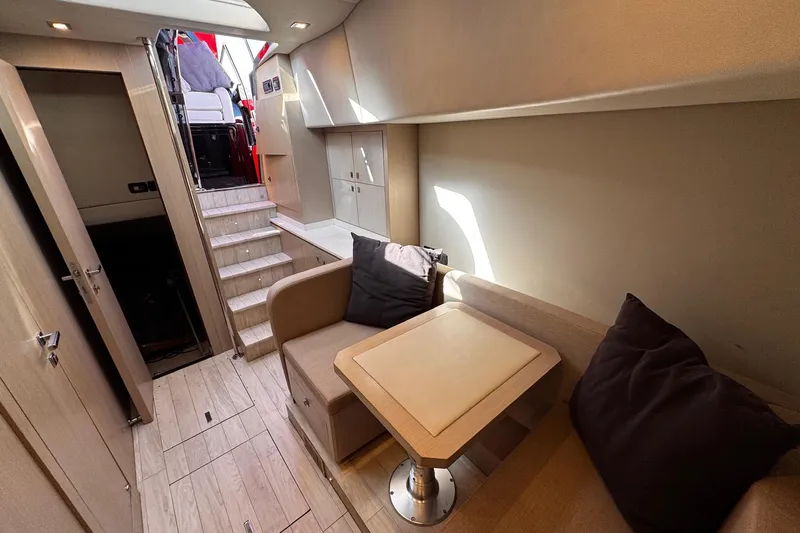  Yacht Photos Pics Luxurious interior of 2015 SACS Strider 19 yacht with seating and stairs.