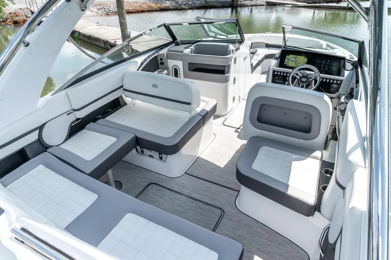  Yacht Photos Pics Luxurious interior of 2023 Cobalt R30 boat with modern seating and dashboard.