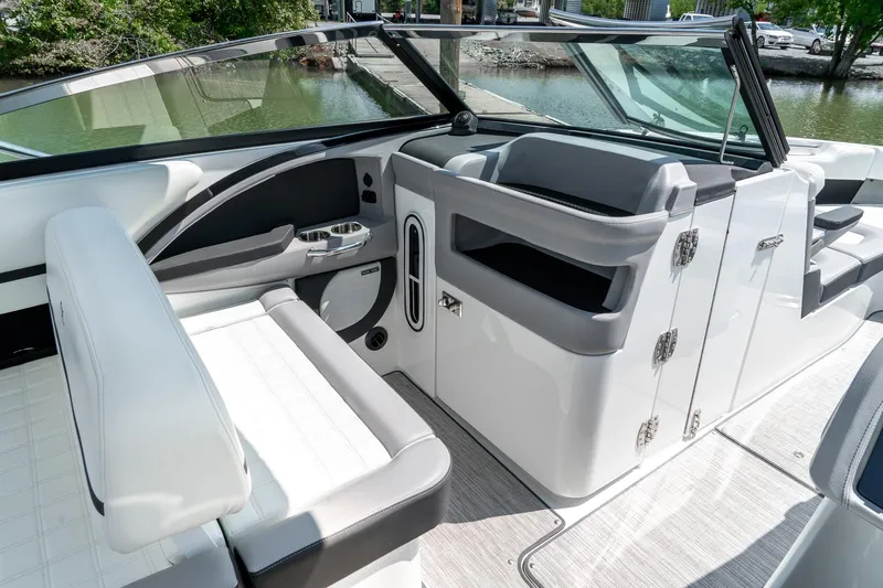 Yacht Photos Pics 2023 Cobalt R30 boat interior with sleek seating and modern design features.