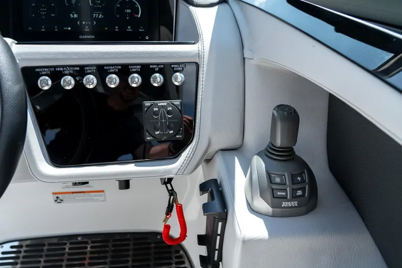  Yacht Photos Pics Control panel of 2023 Cobalt R30 boat with switches and joystick.