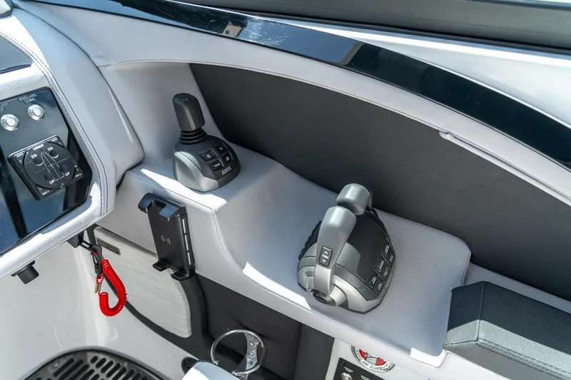  Yacht Photos Pics 2023 Cobalt R30 boat cockpit with joystick and throttle controls.