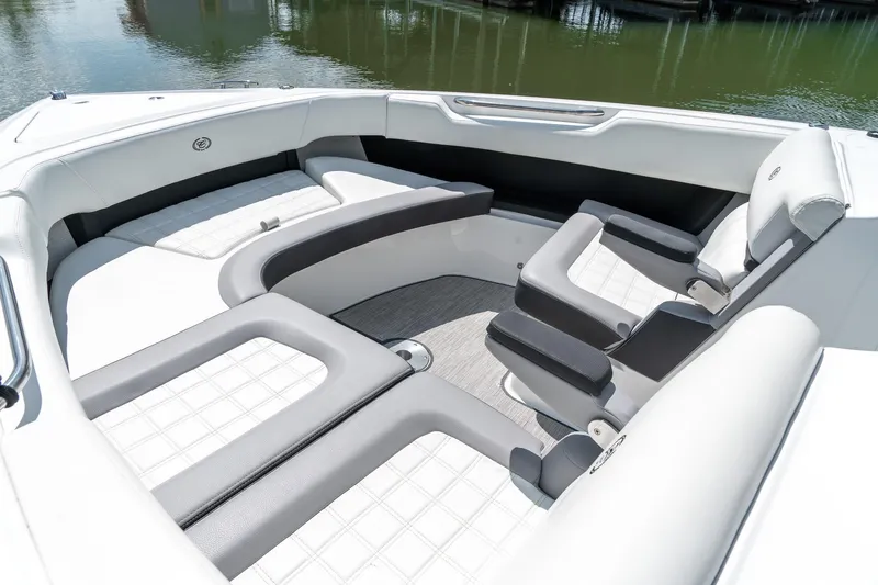 Yacht Photos Pics Luxurious seating area on 2023 Cobalt R30 boat, featuring elegant white upholstery.