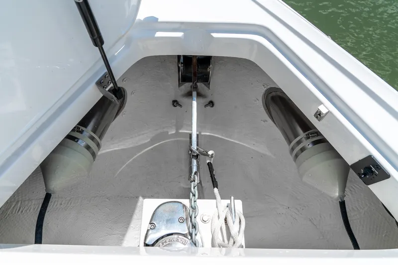  Yacht Photos Pics Anchor compartment of 2023 Cobalt R30 boat with chain and rope.