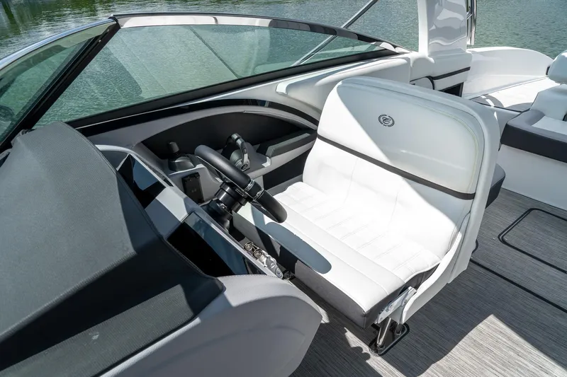  Yacht Photos Pics 2023 Cobalt R30 boat interior with white seating and modern dashboard design.