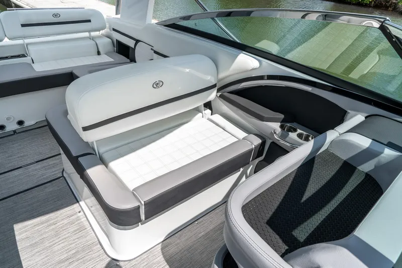  Yacht Photos Pics 2023 Cobalt R30 boat interior with luxurious seating and cup holders.