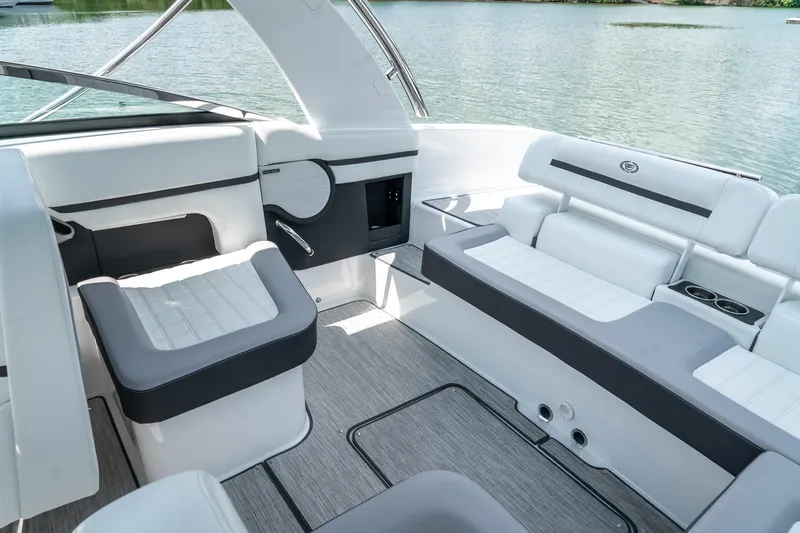  Yacht Photos Pics Luxurious interior of 2023 Cobalt R30 boat with plush seating and modern design.