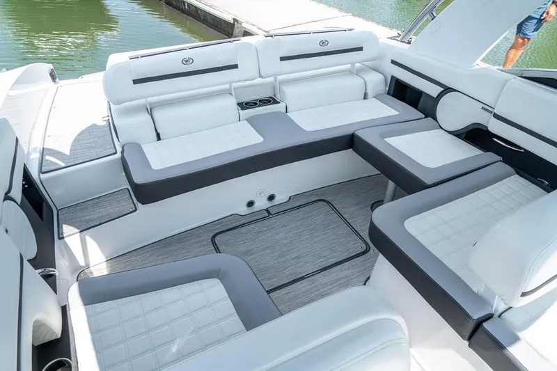  Yacht Photos Pics 2023 Cobalt R30 boat interior with luxurious white seating and modern design.